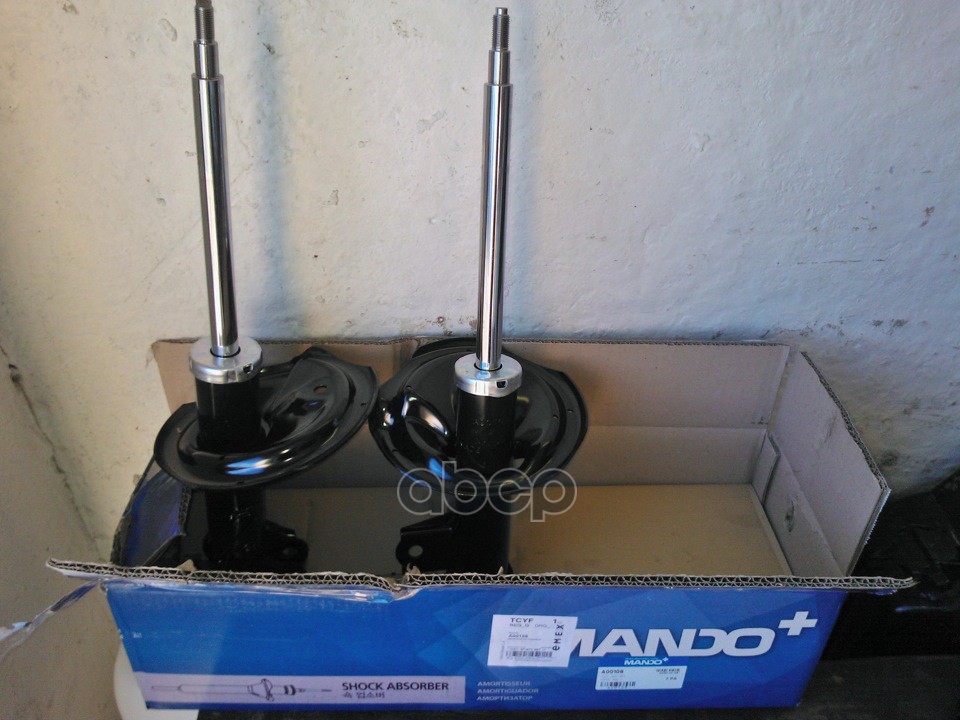 Амортизатор передний L KIA Cerato II 2009-> MANDO A00109 Mando арт. A00109